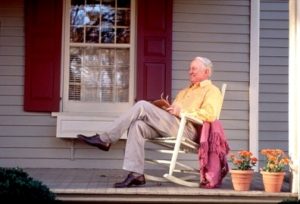 elderly man rocking at home